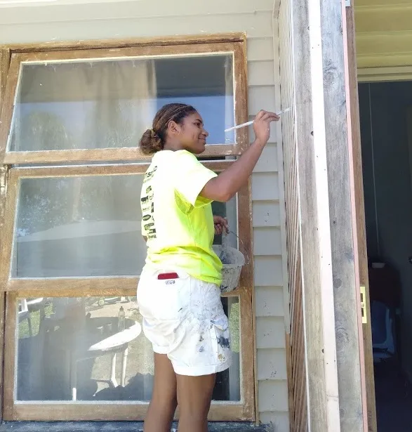 exterior painting Employment Services Painting Futures II Townsville painting building clothing door footwear house ladder outdoor person shorts window woman