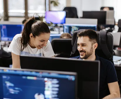 Two people in ICT room